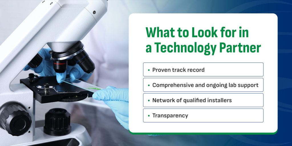 gloved hands putting a sample under a microscope with text explaining what to look for in a technology partner